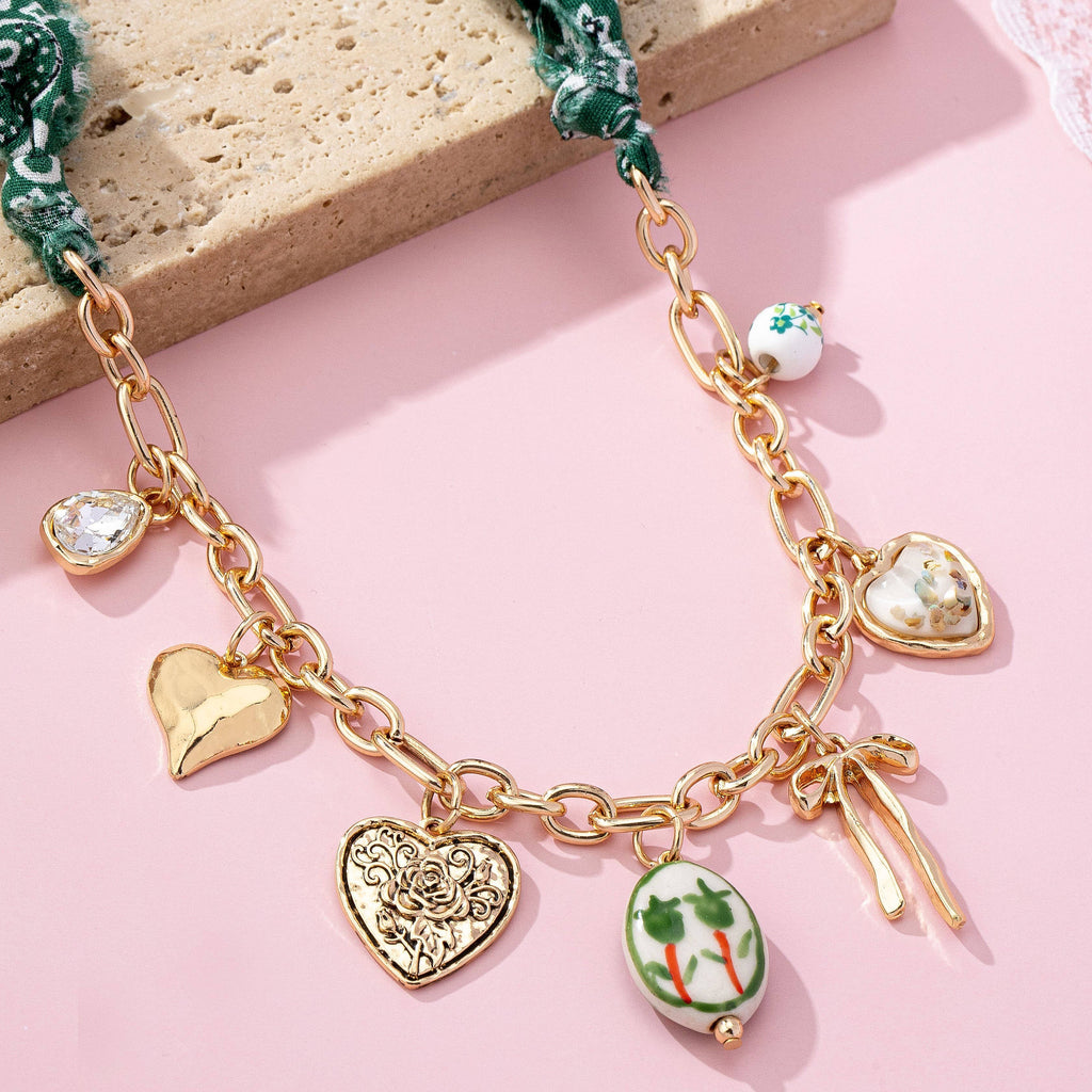 SCARF CHARM NECKLACE-PORCELAIN HEART BOW | 80N92717