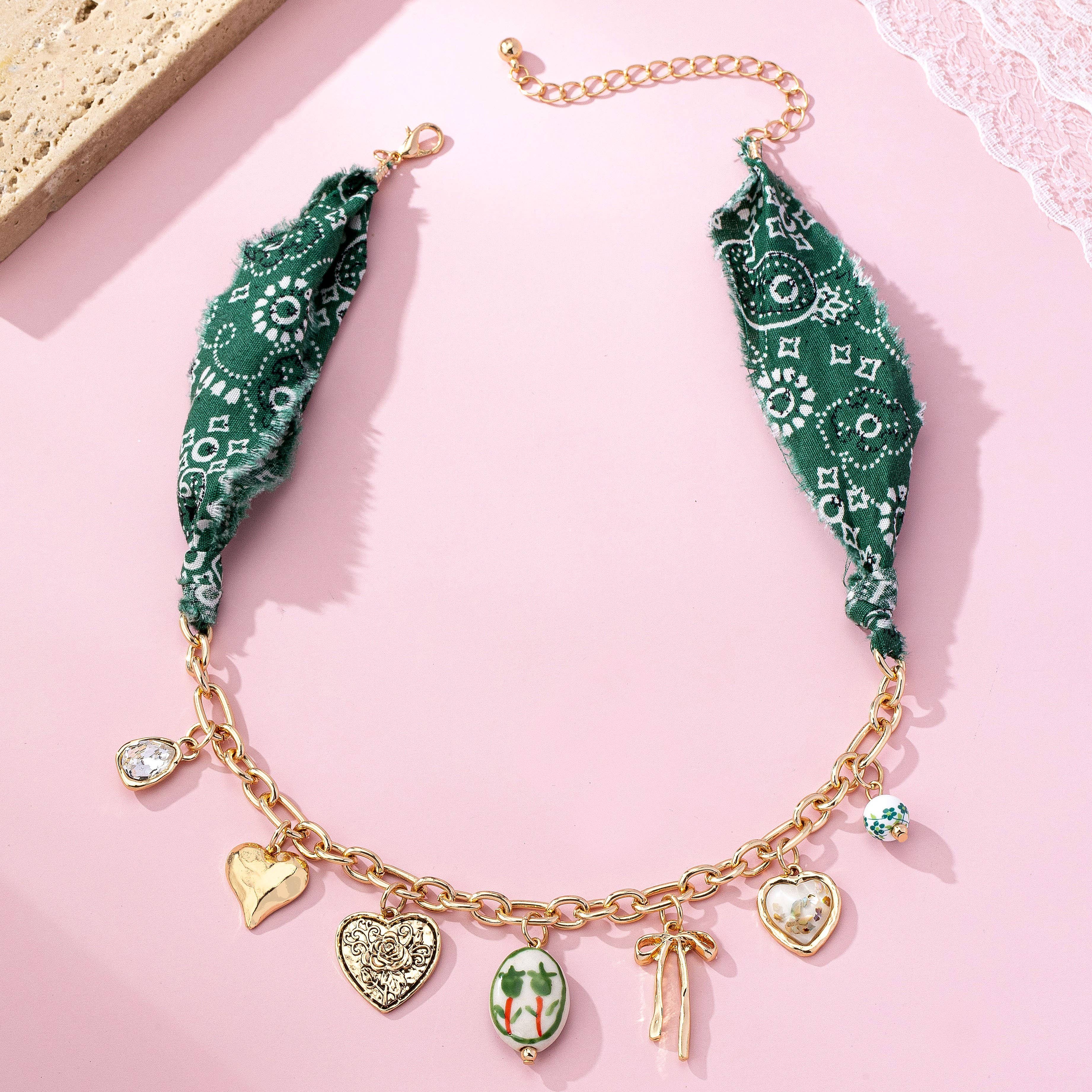 SCARF CHARM NECKLACE-PORCELAIN HEART BOW | 80N92717
